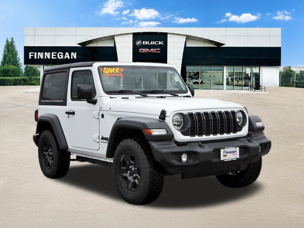 2025 Jeep Wrangler Sport in White — front three-quarter view