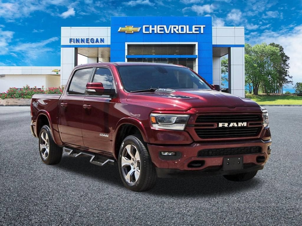 2019 RAM 1500 Laramie in Red — front three-quarter view