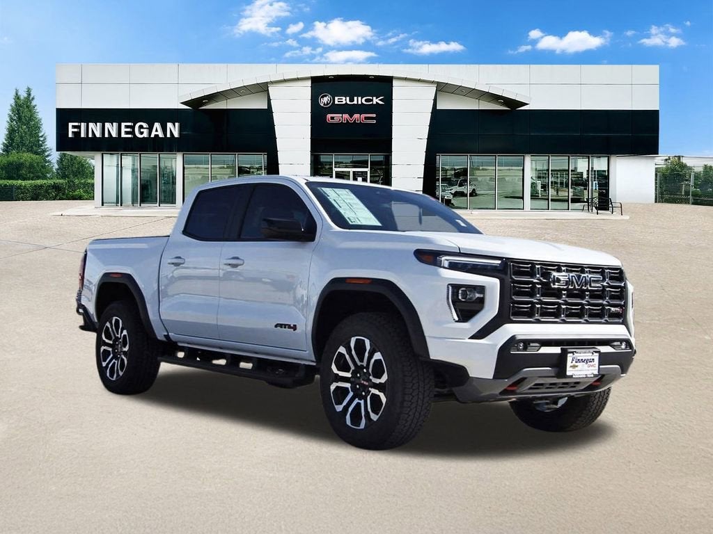 2026 GMC Canyon AT4 in Summit White — front three-quarter view