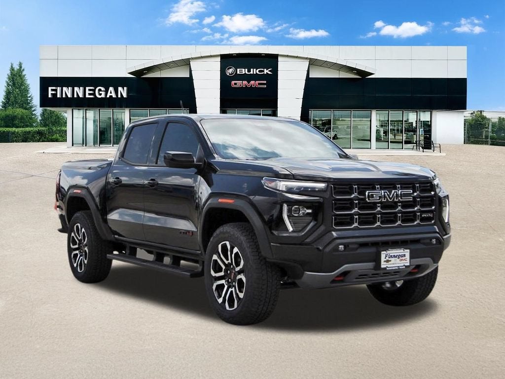 2026 GMC Canyon AT4 in Onyx Black — front three-quarter view