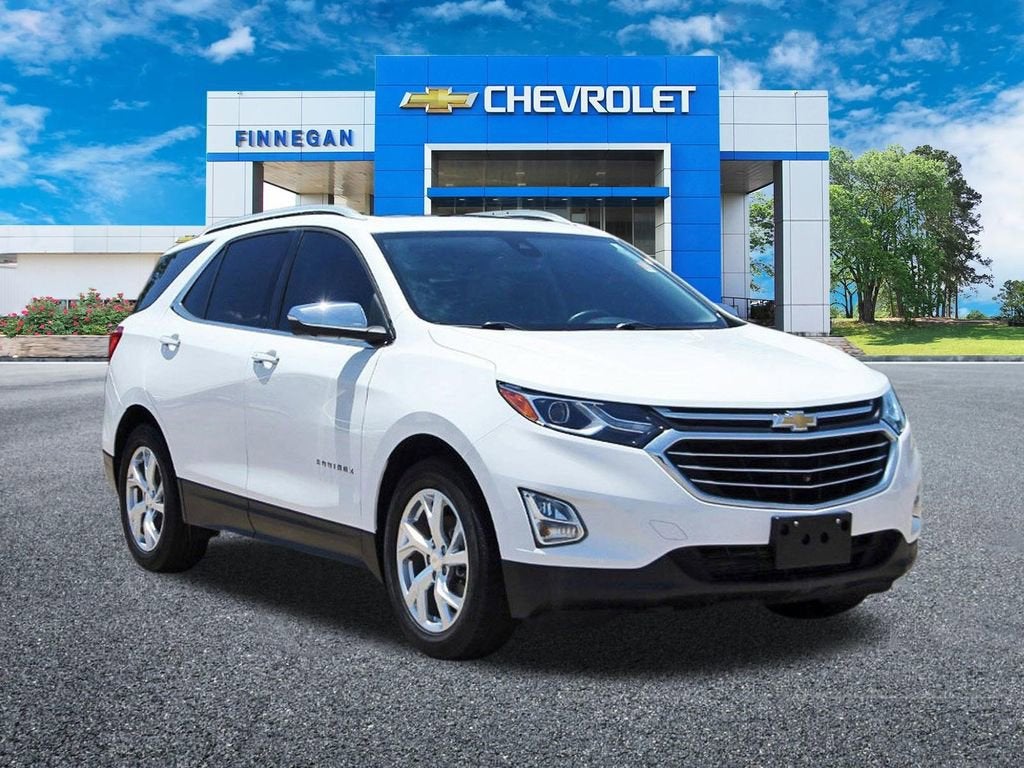 2021 Chevrolet Equinox Premier in Summit White — front three-quarter view