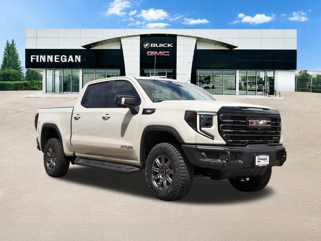 2026 GMC Sierra 1500 AT4X in Coastal Dune — front three-quarter view