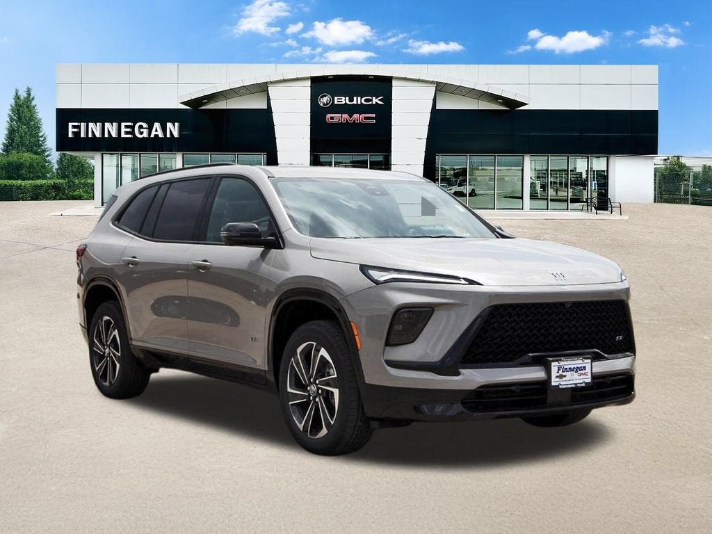 2026 Buick Enclave Sport Touring in Stone Metallic — front three-quarter view