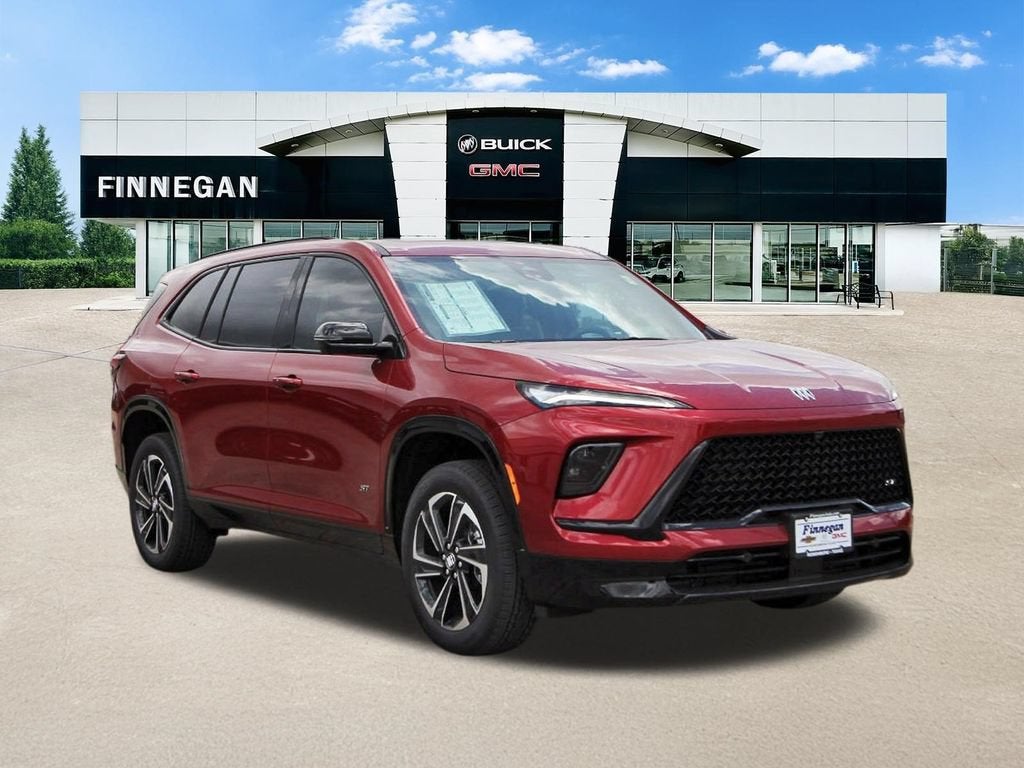 2026 Buick Enclave Sport Touring in Cherry Red Tintcoat — front three-quarter view