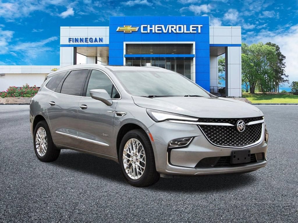 2023 Buick Enclave Avenir in Moonstone Gray Metallic — front three-quarter view