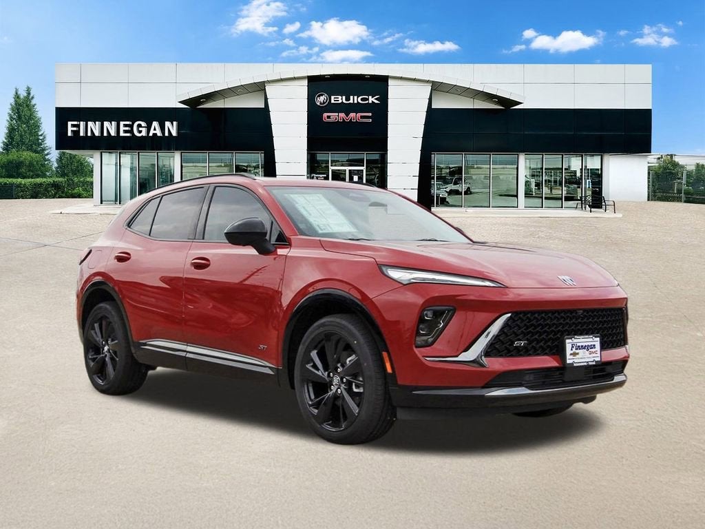 2026 Buick Envision Sport Touring in Brilliant Red — front three-quarter view